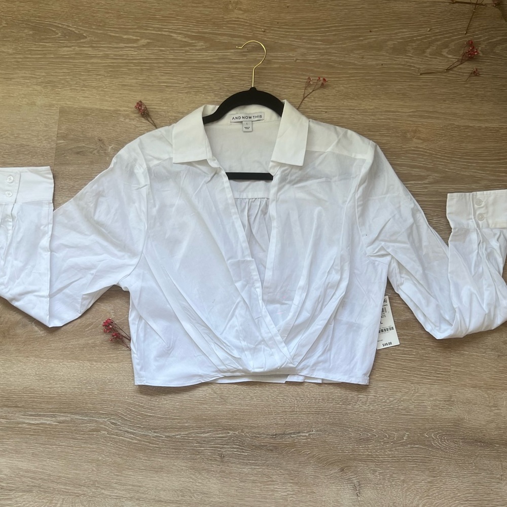 Women “And Now This” long sleeve shirt.